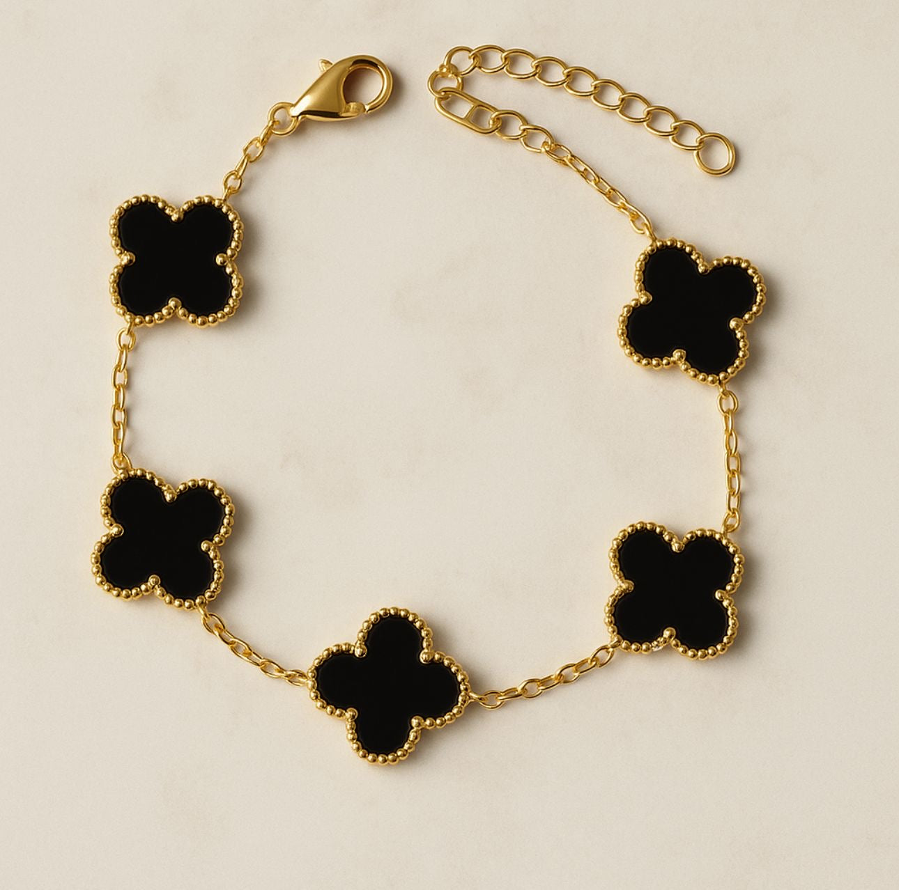 Klaver armband zwart/goud